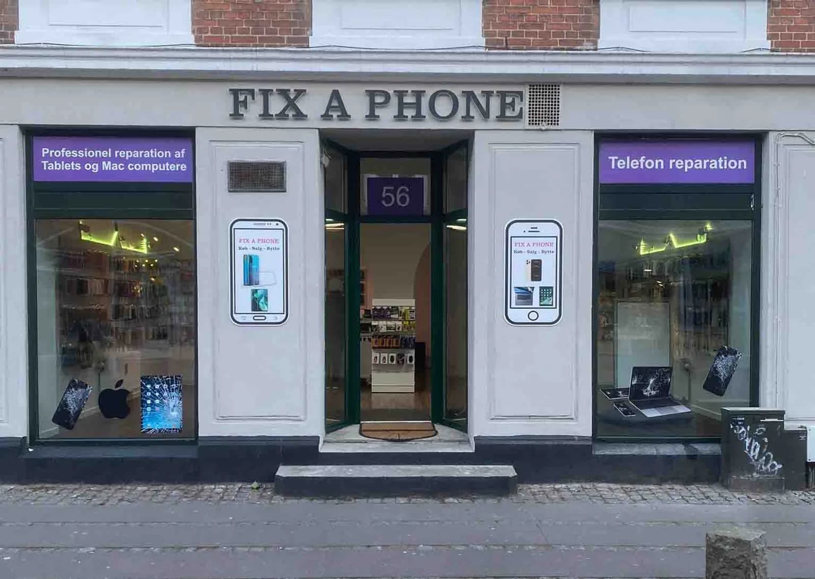 Butiksfacade med skilt og vinduesfolie til Fix A Phone